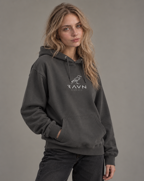Woman wearing the Noa Hoodie in vintage black