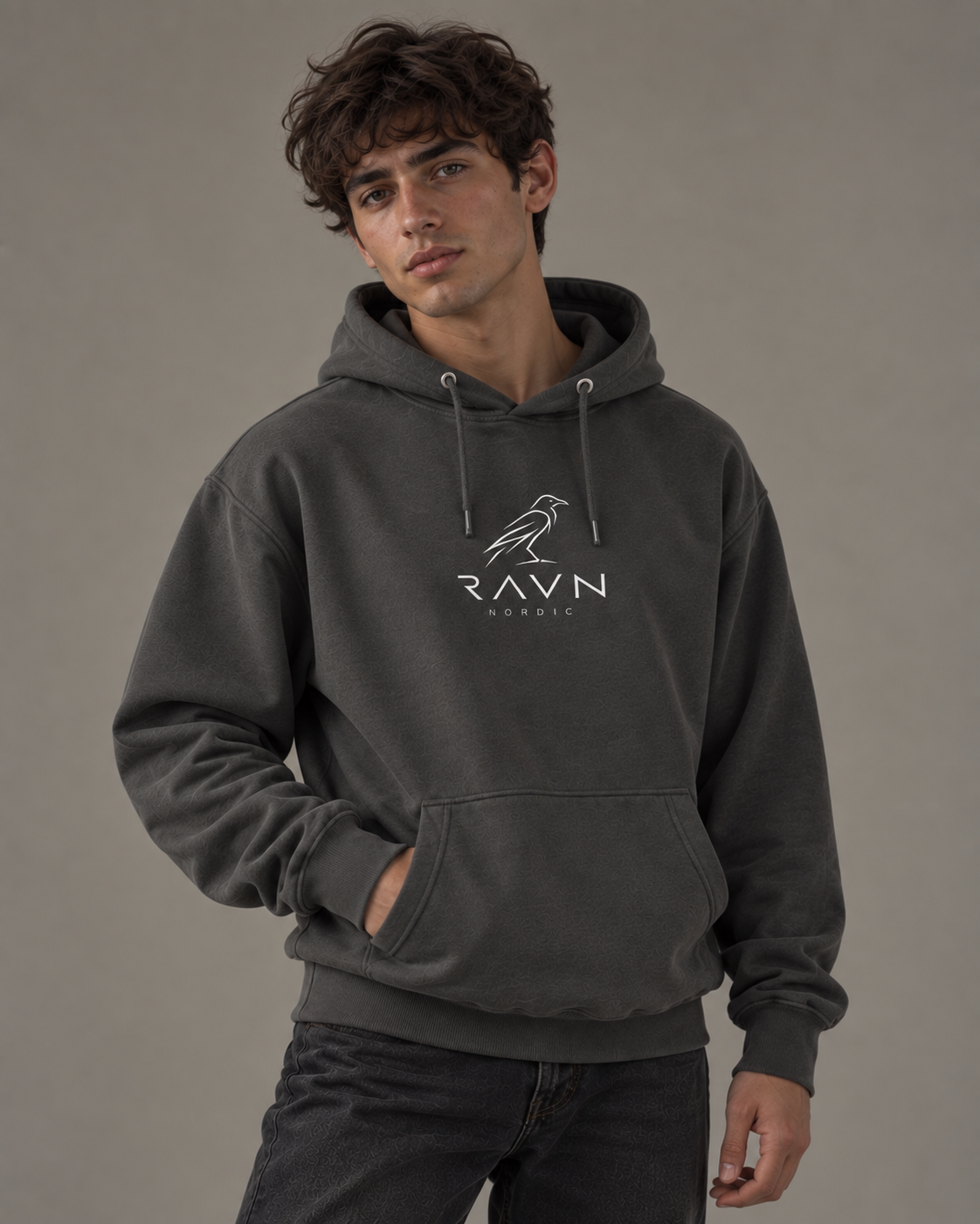 Man wearing the Noa Hoodie in vintage black