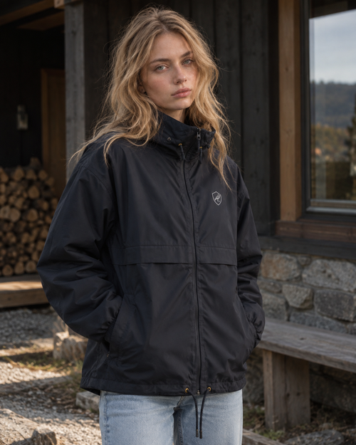 Woman wearing the Gust Windbreaker in navy