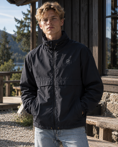 Man wearing the Gust Windbreaker in navy